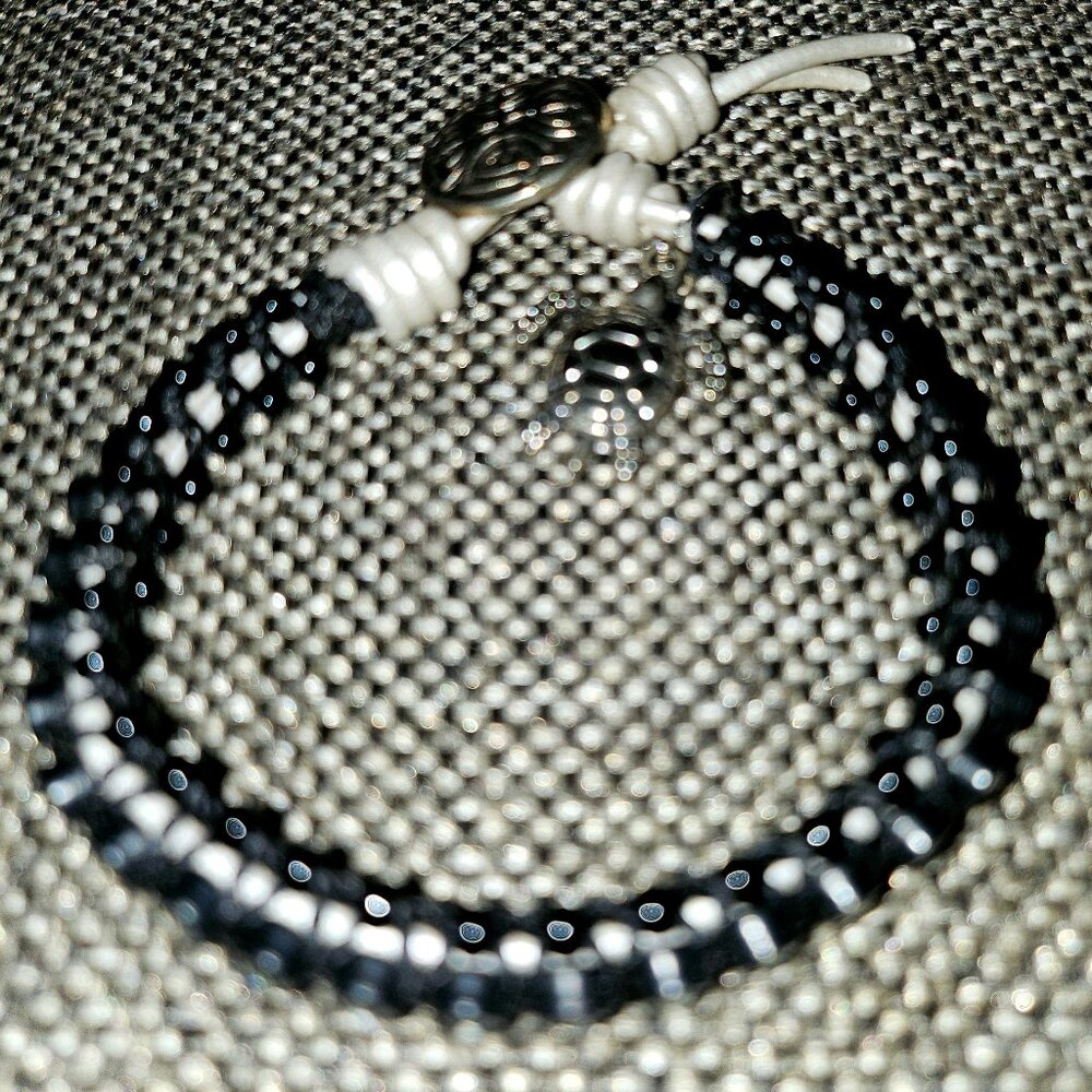 Bracelet with Rhinestones Set in Black Beads with White Tie and Turtle Charm - Picture 3 of 9